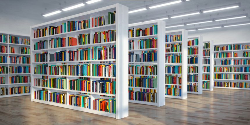 Library. Background from white bookshelves with books and textb