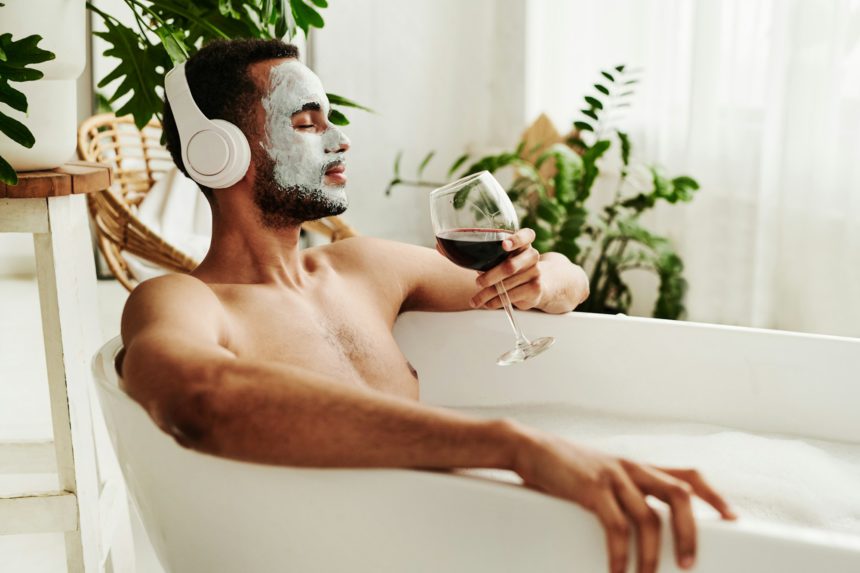 Man having spa procedure in bathroom